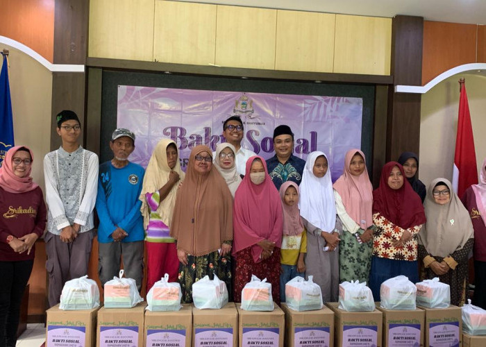 SRIKADIN Berbagi dengan Warga Miskin Kampung Sri Rahayu