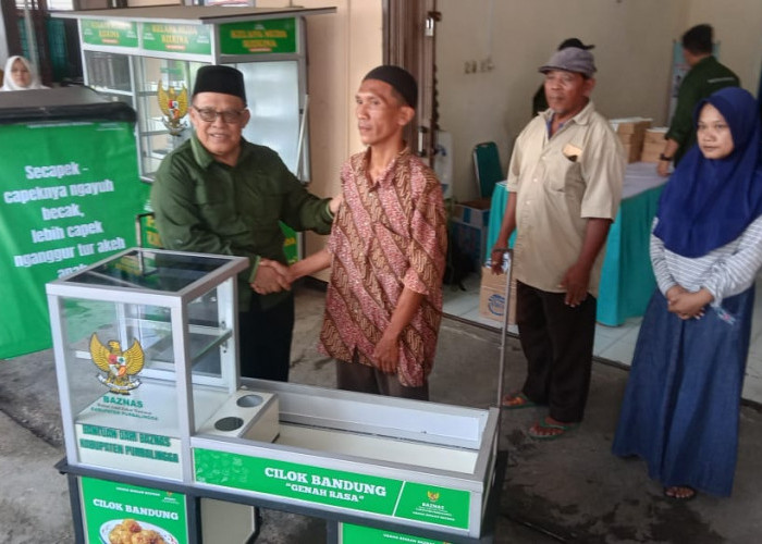 Akhir Tahun, Baznas Salurkan Bantuan  Rp 242,85 Juta
