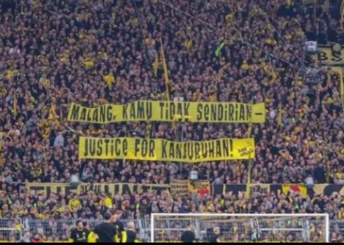 'Malang Kamu Tidak Sendirian' Muncul di Tribun Suporter Dortmund 